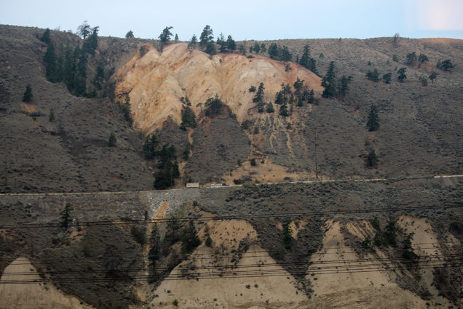 Rocky Mountains from VIA viewing freight train on other side of cliff. Somewhere east of Vancouver #3